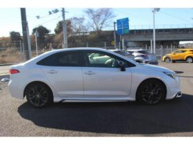 TOYOTA COROLLA HYBRID WxB | WHITE | 2023